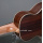 Ukulele pequeno de rosewood atacado